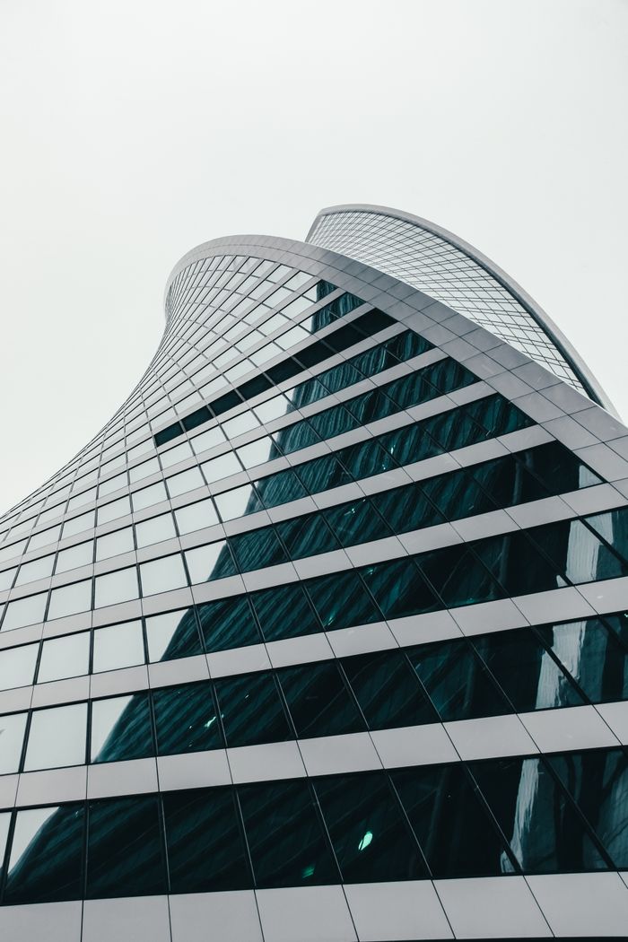 Dynamic low angle shot of the Evolution Tower in Moscow, showcasing modern architecture.