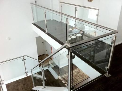 Abstract black and white view of modern glass architecture with geometric lines.