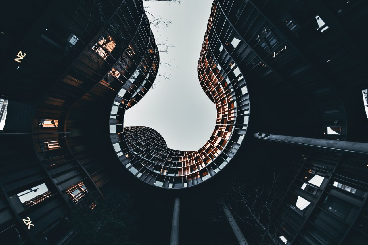 Low angle view of a modern building in Copenhagen, Denmark showcasing urban architectural design.