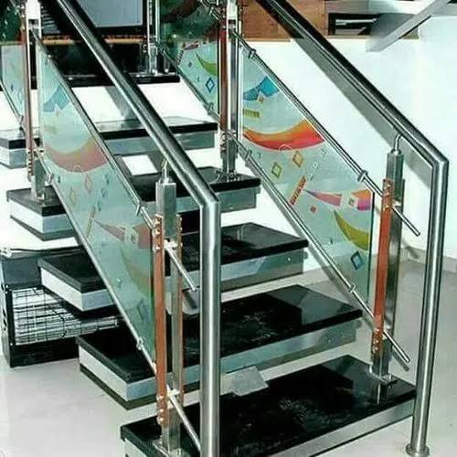 Closeup of a modern building facade with glass and metal elements showcasing urban architecture.
