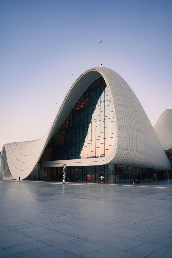 Explore the stunning curves of the Heydar Aliyev Center in Baku, a masterpiece of modern architecture.